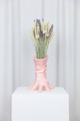pink vase shaped like a glove with flowers in it Logo Progressive Present