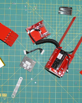 red metal parts of a lamp Logo Progressive Present