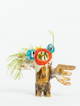 Handmade ceramic sculpture with whimsical character and pine branches, unique artistic home decor Logo Progressive Present