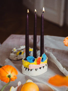 Handmade ceramic candle holder with colorful artistic design, unique decor for creative home styling Logo Progressive Present
